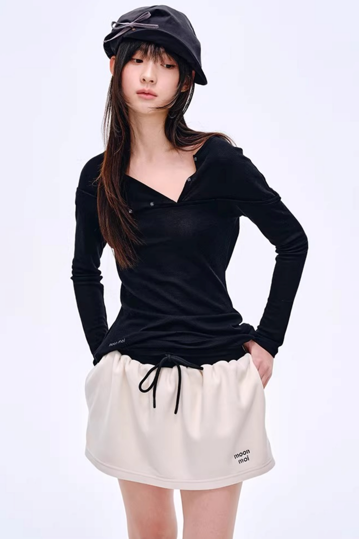 Blusa asimmetrica in misto lana