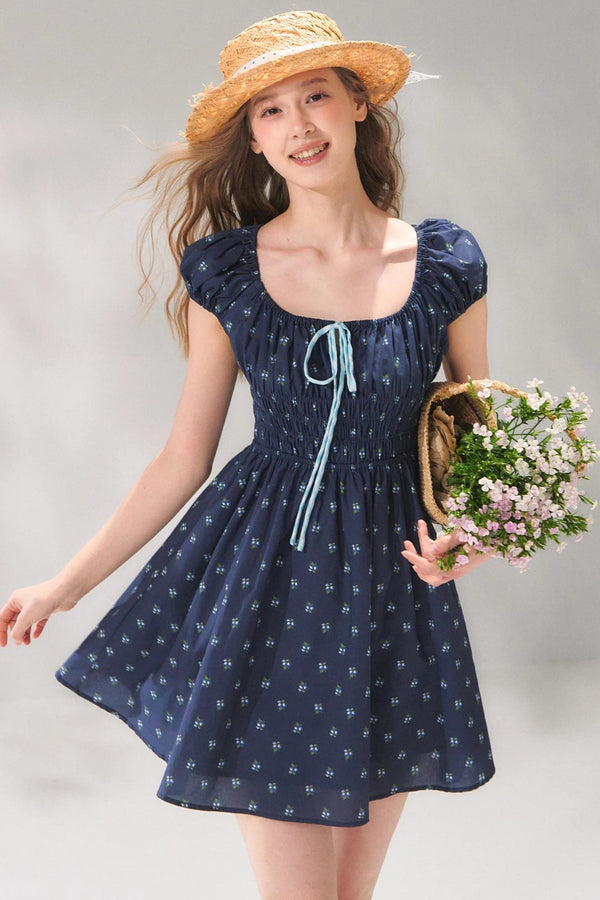 Vestido floral azul marino con lazo