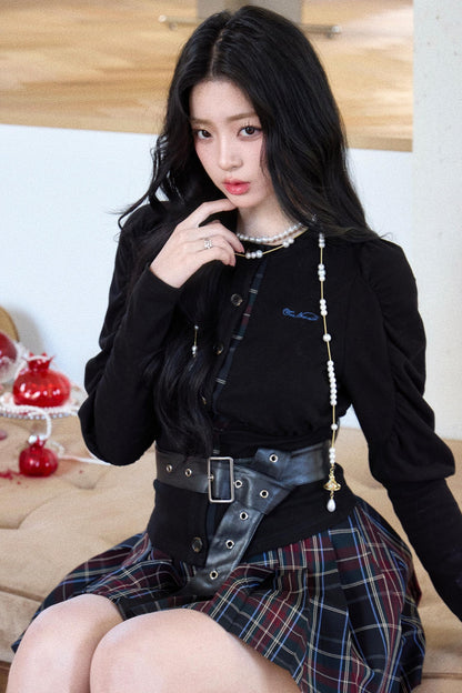 Chemise noire à manches bouffantes avec ceinture