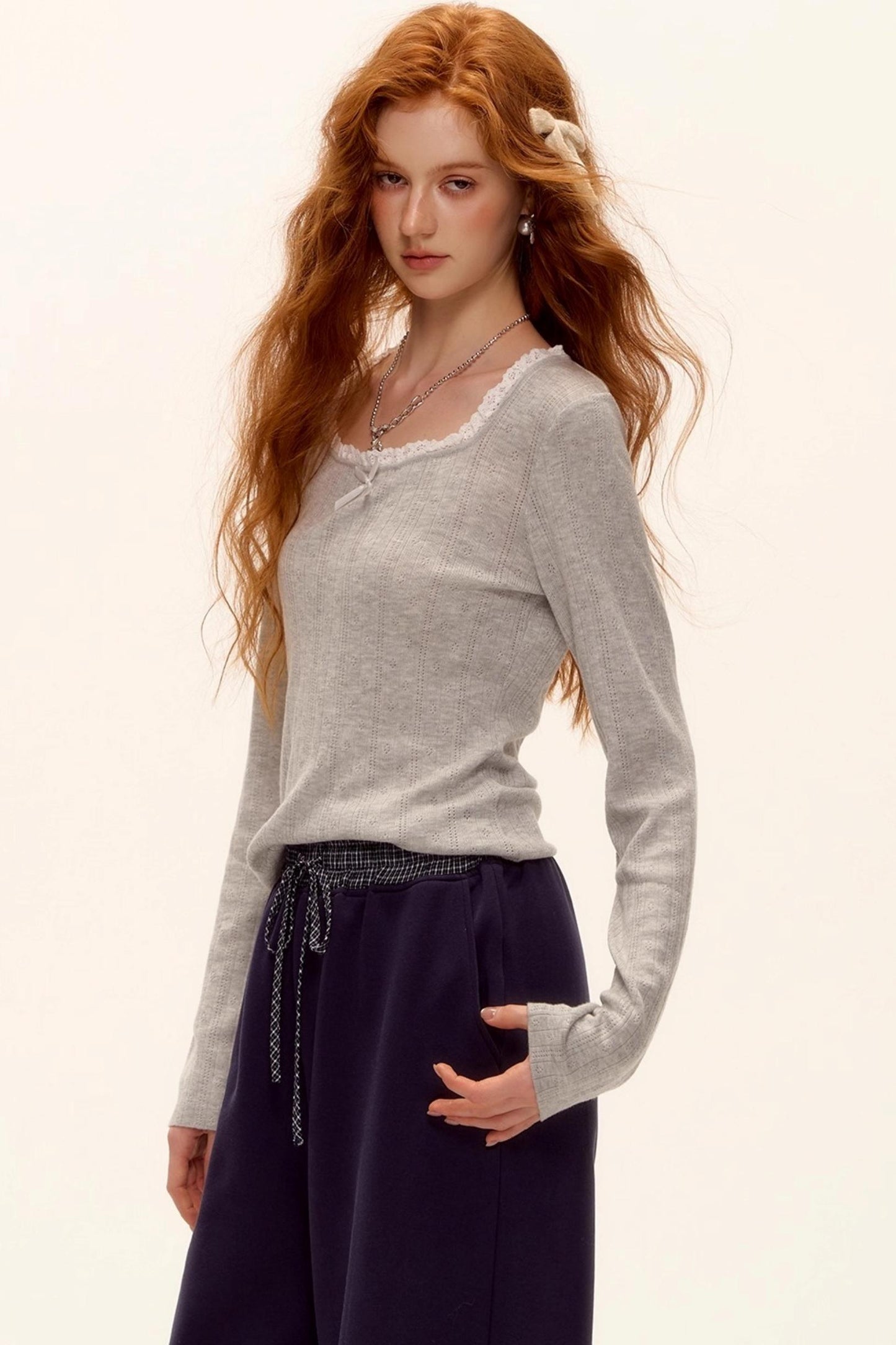 Lace-Trimmed Bow Hollow Knit Top
