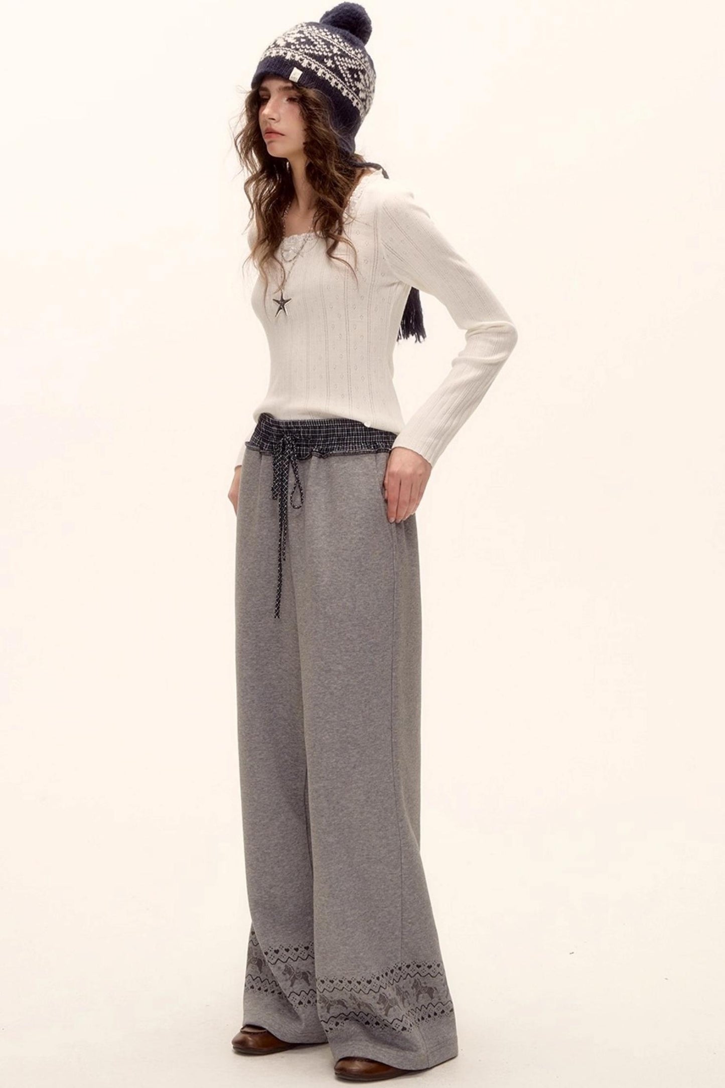 Lace-Trimmed Bow Hollow Knit Top