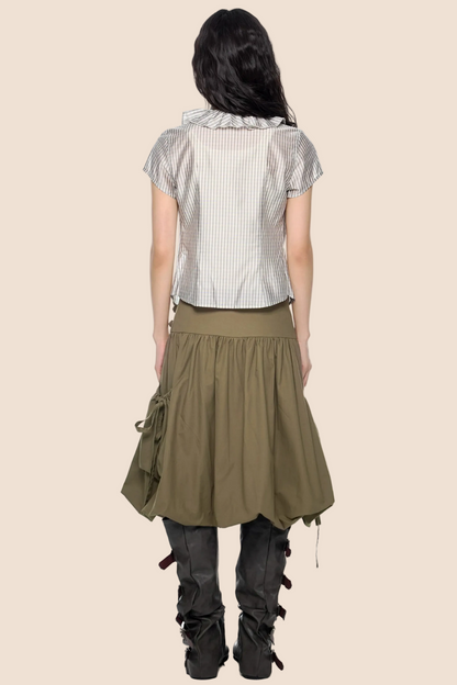 Blusa a quadri con pizzo e scollo a V