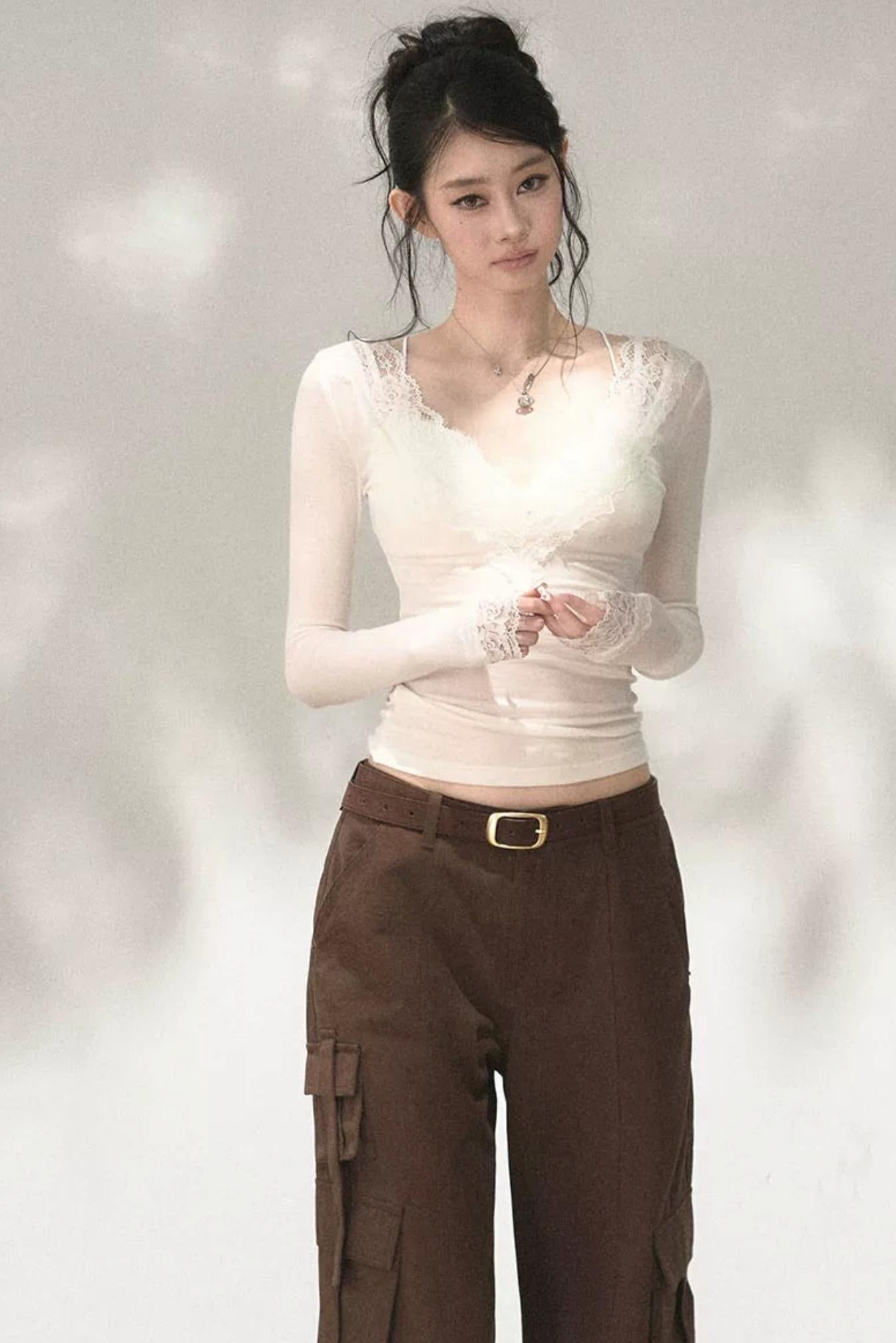 Top in maglia di pizzo a toppe