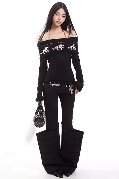 Schwarzer Strickpullover mit schulterfreiem Design