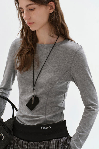 Haut polyvalent à manches longues et coupe slim