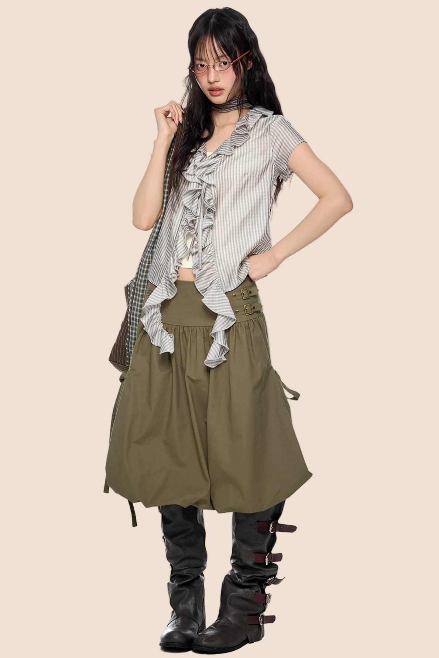 Blusa a quadri con pizzo e scollo a V