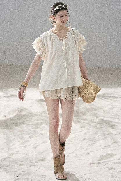 Bestickte V-Ausschnitt-Bluse