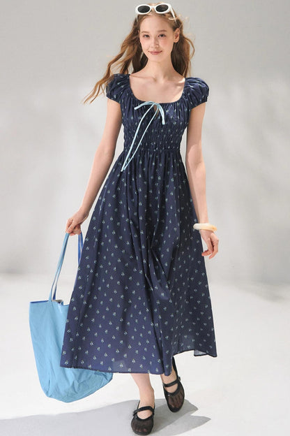 Abito floreale blu navy con lacci