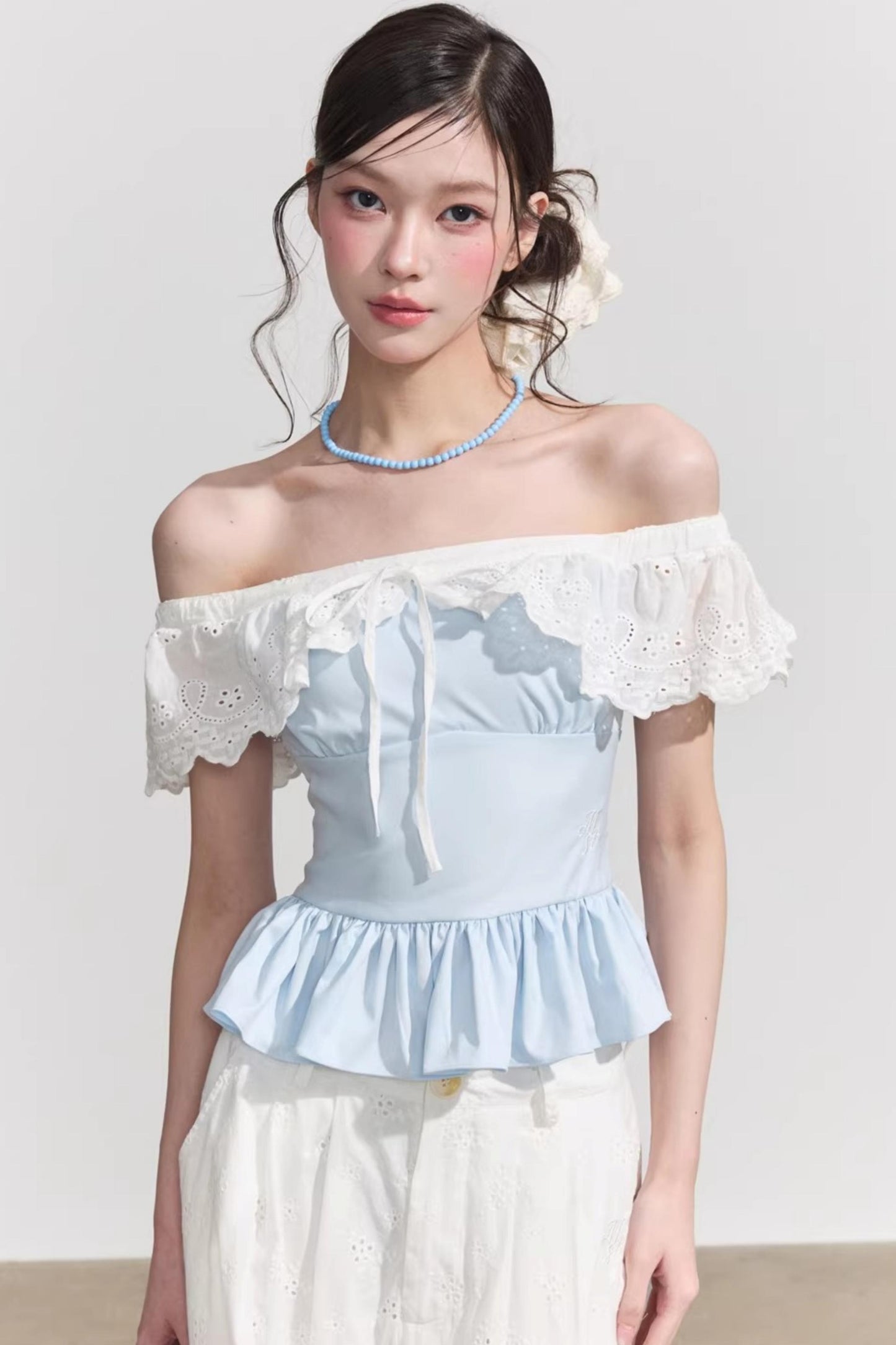 Blusa francese a fiori con volant