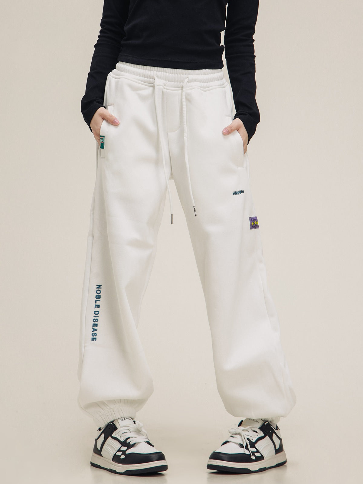 American label embroidered sweat pants