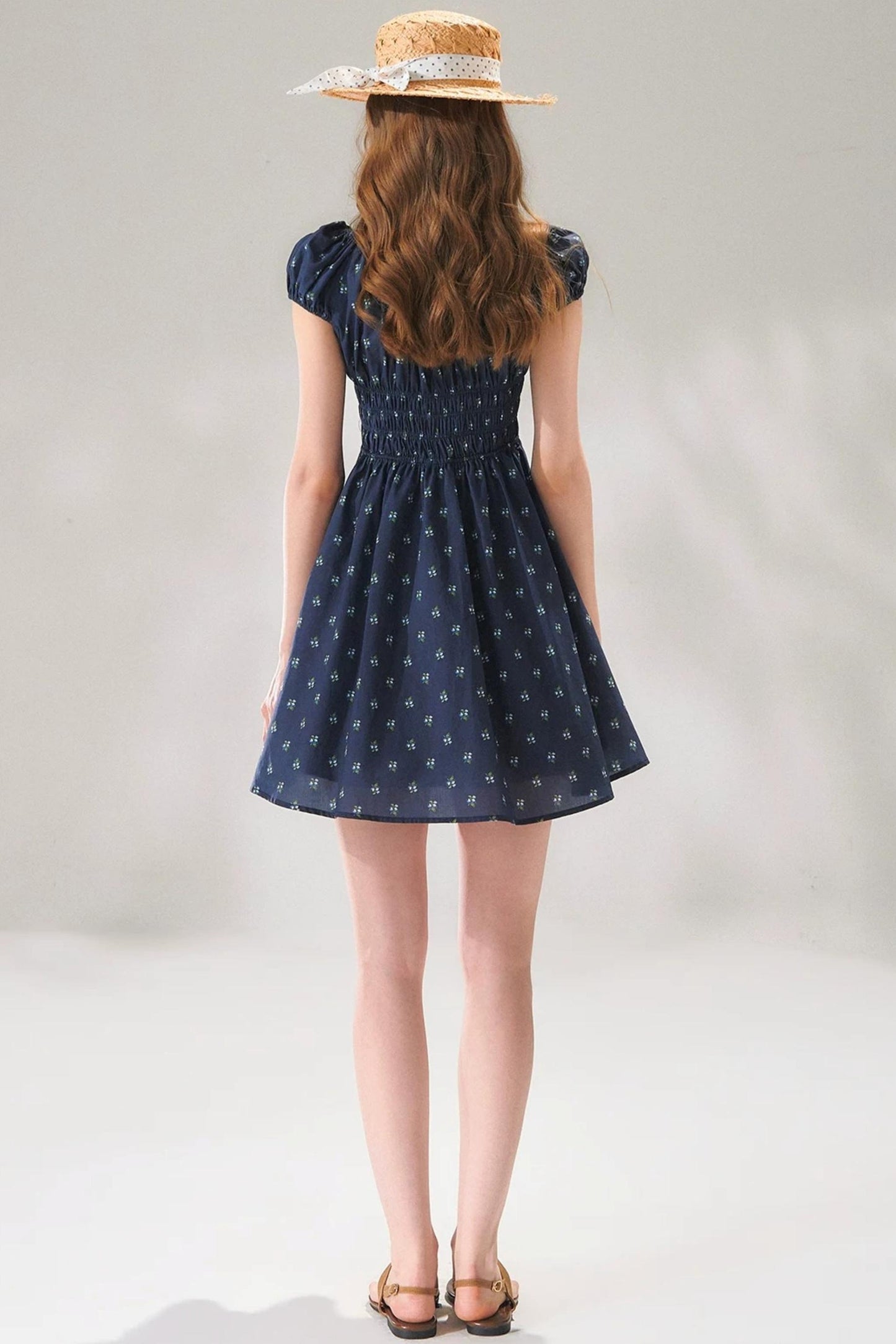 Abito floreale blu navy con lacci