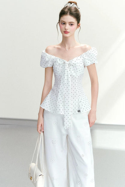 Camicetta a pois con laccetti