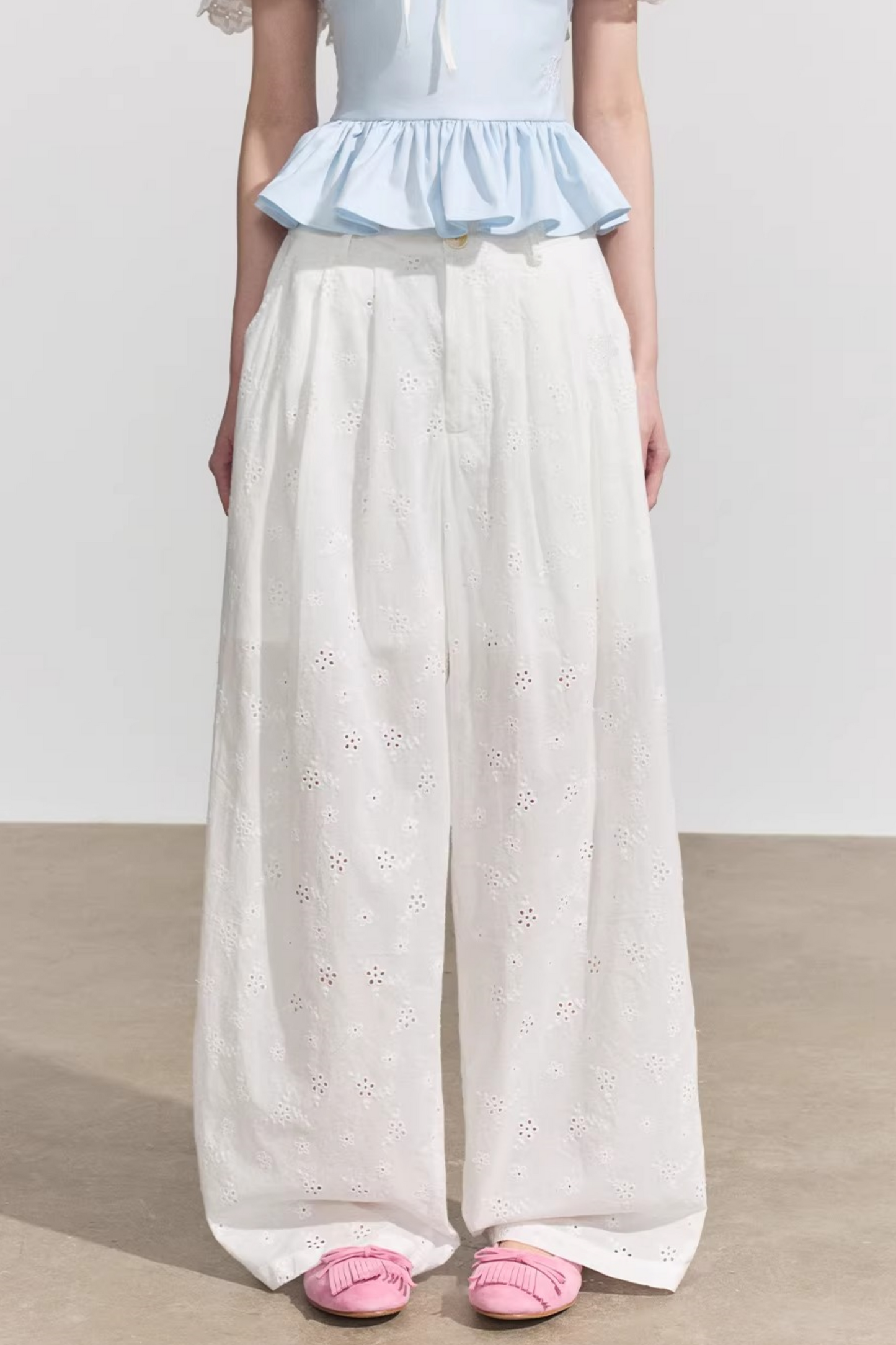 Pantaloni in cotone floreale bianco