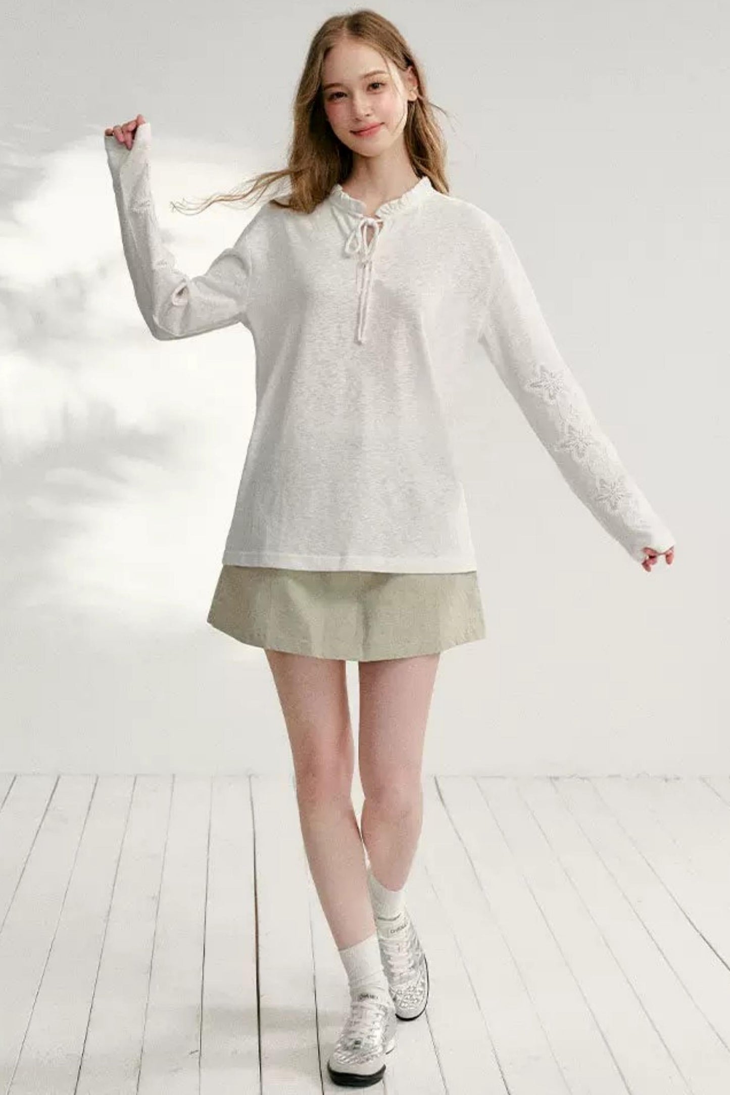 Hollow Floral Tie-Up Blouse