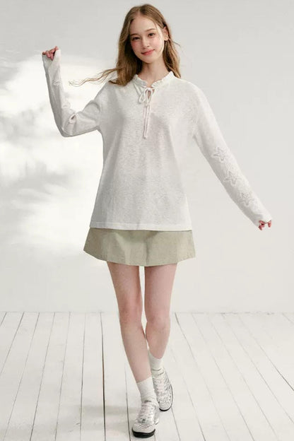 Hollow Floral Tie-Up Blouse