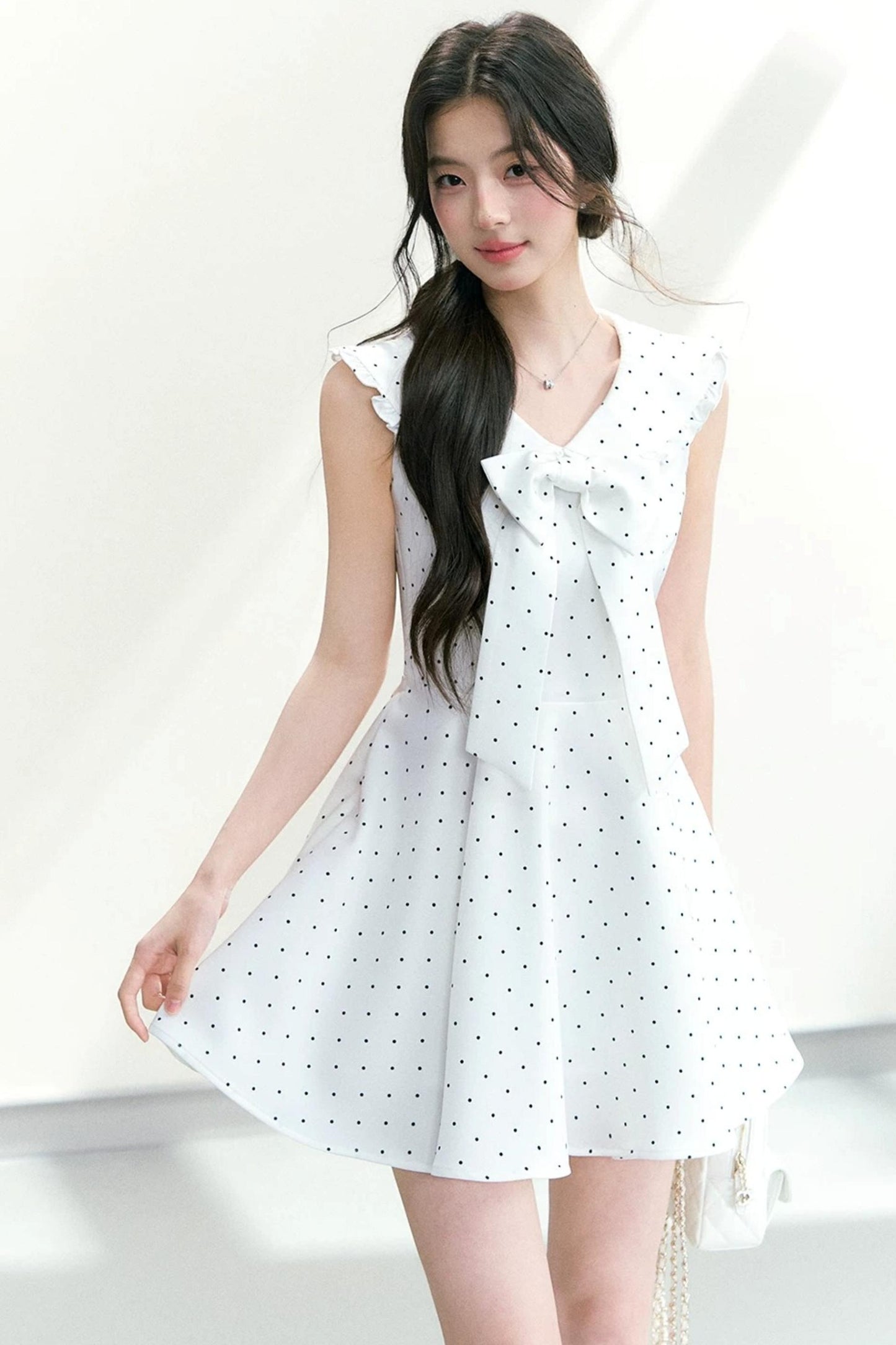 Vestido de lunares con cuello de lazo