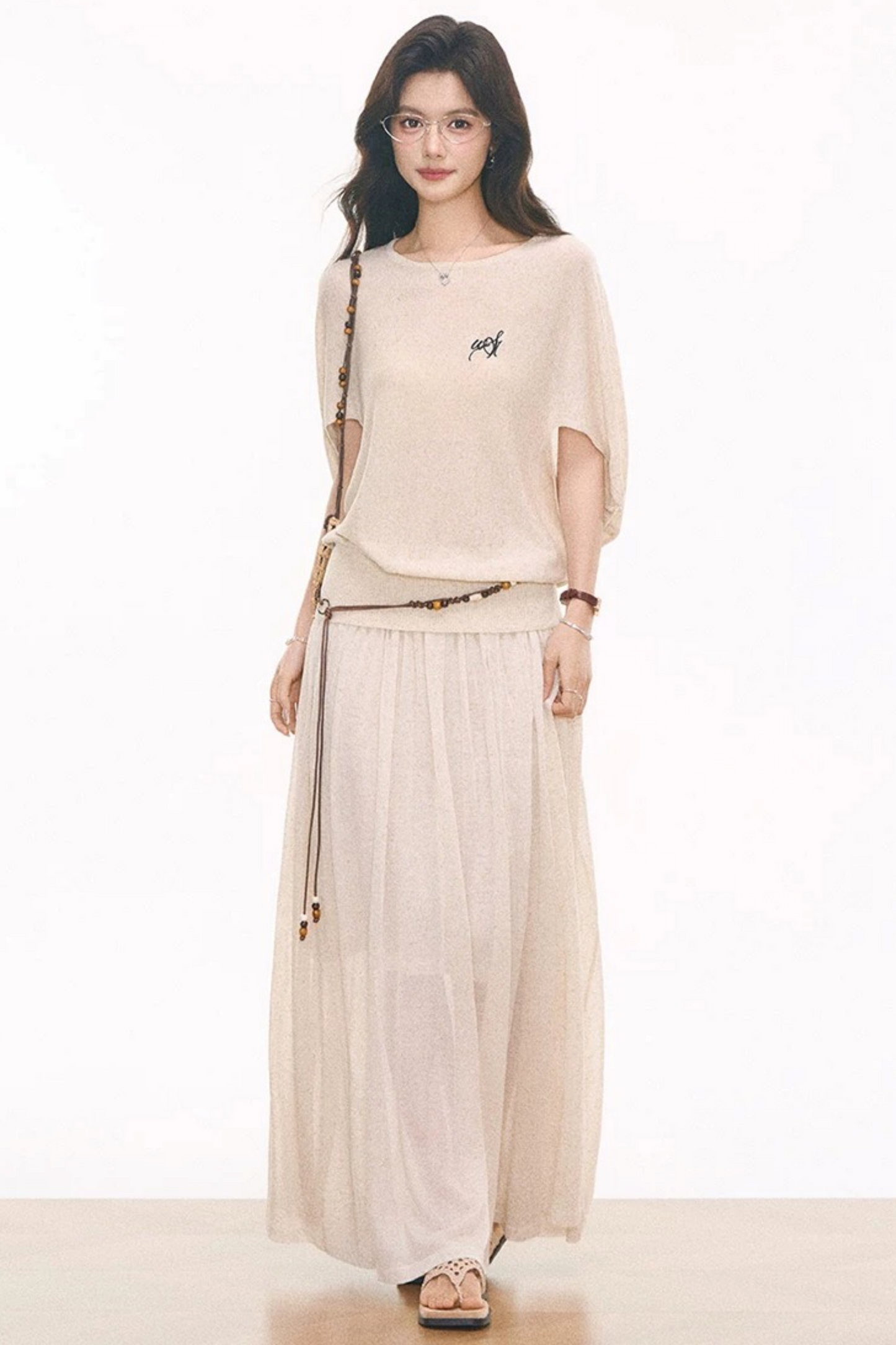 Completo top in maglia, gonna e catena