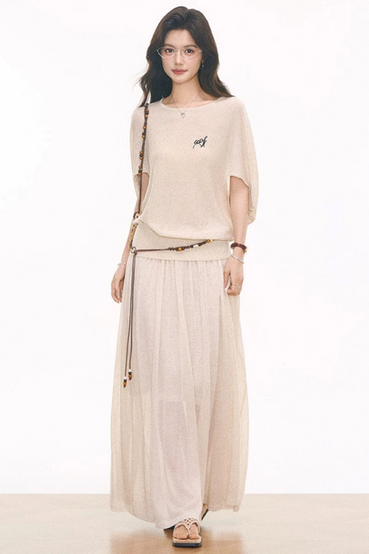 Completo top in maglia, gonna e catena