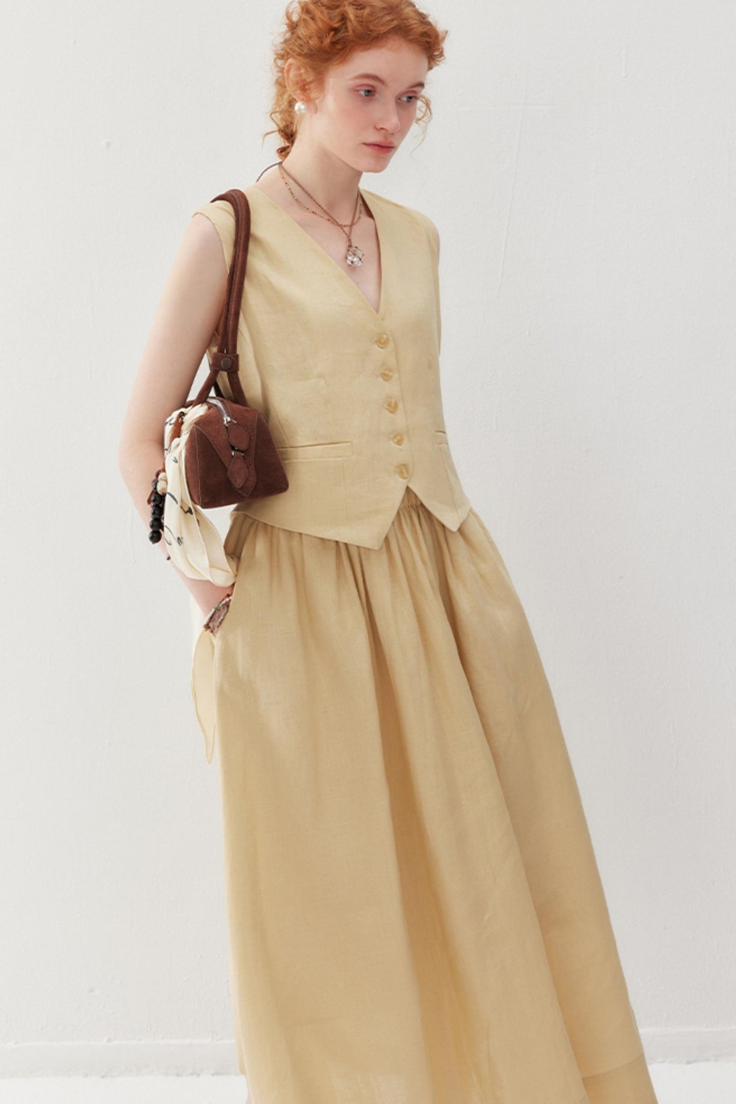 Elegant V-Neck & Pleated Skirt Set