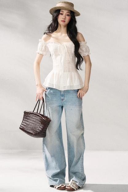 Pantaloni in denim blu a gamba dritta