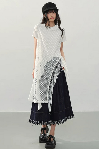 Robe à franges tissée avec découpes irrégulières