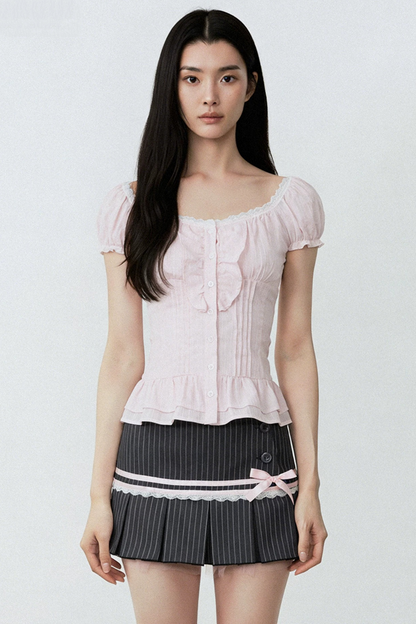 Conjunto de blusa con volantes rosa puro