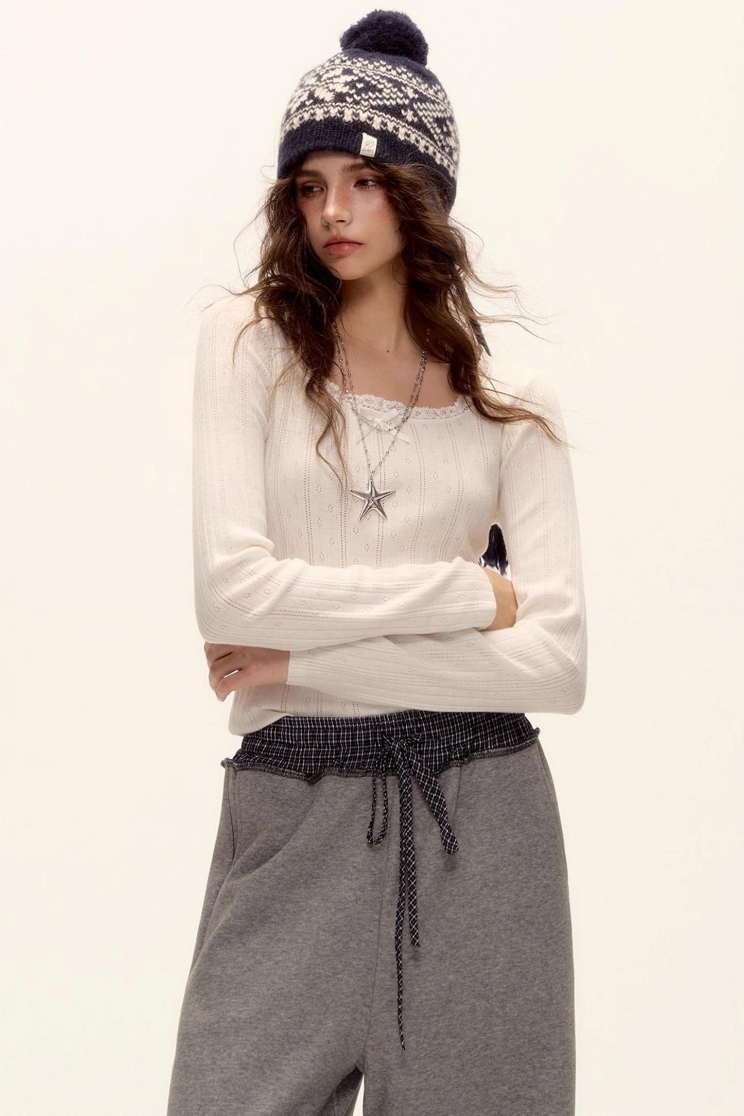 Lace-Trimmed Bow Hollow Knit Top