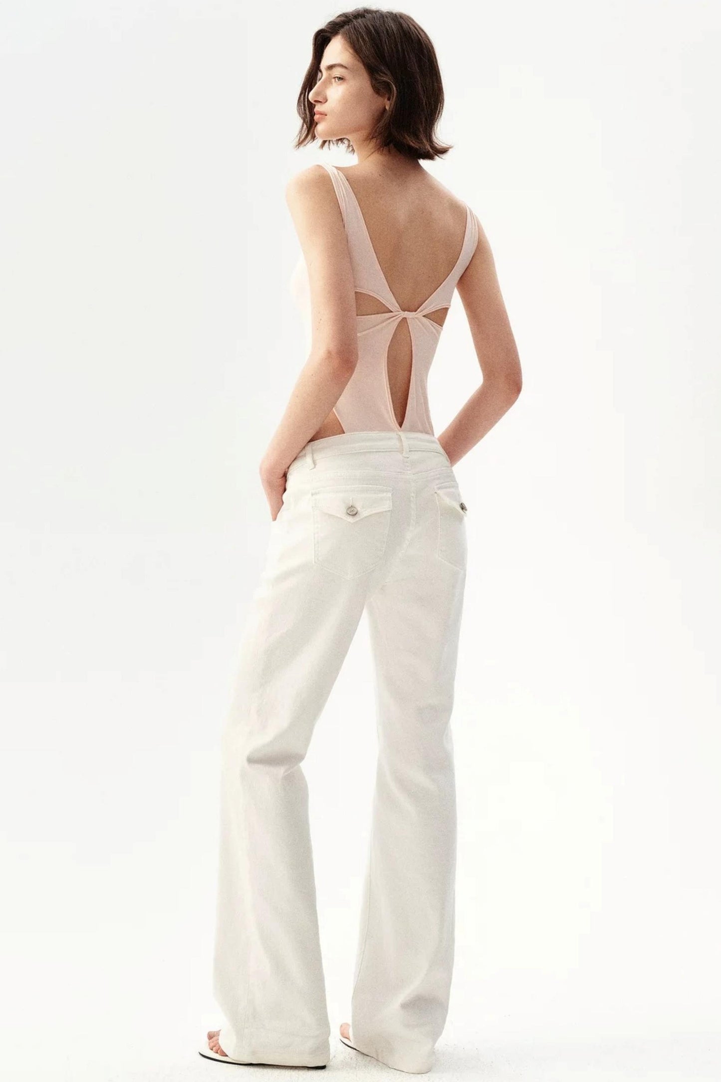 Body rétro in pizzo senza maniche con cut-out