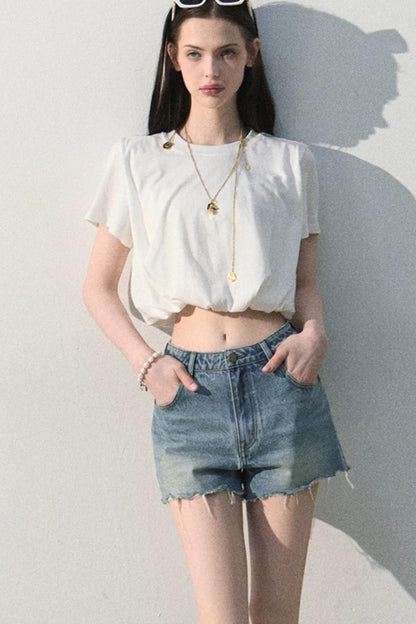 Blusa in lino plissettata a bocciolo