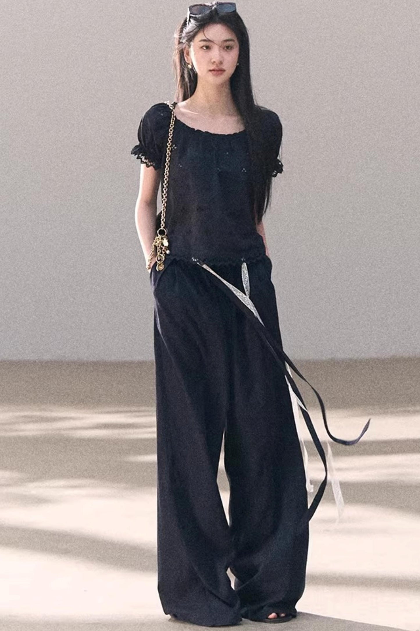 Pantalones de lino y lyocell con encaje