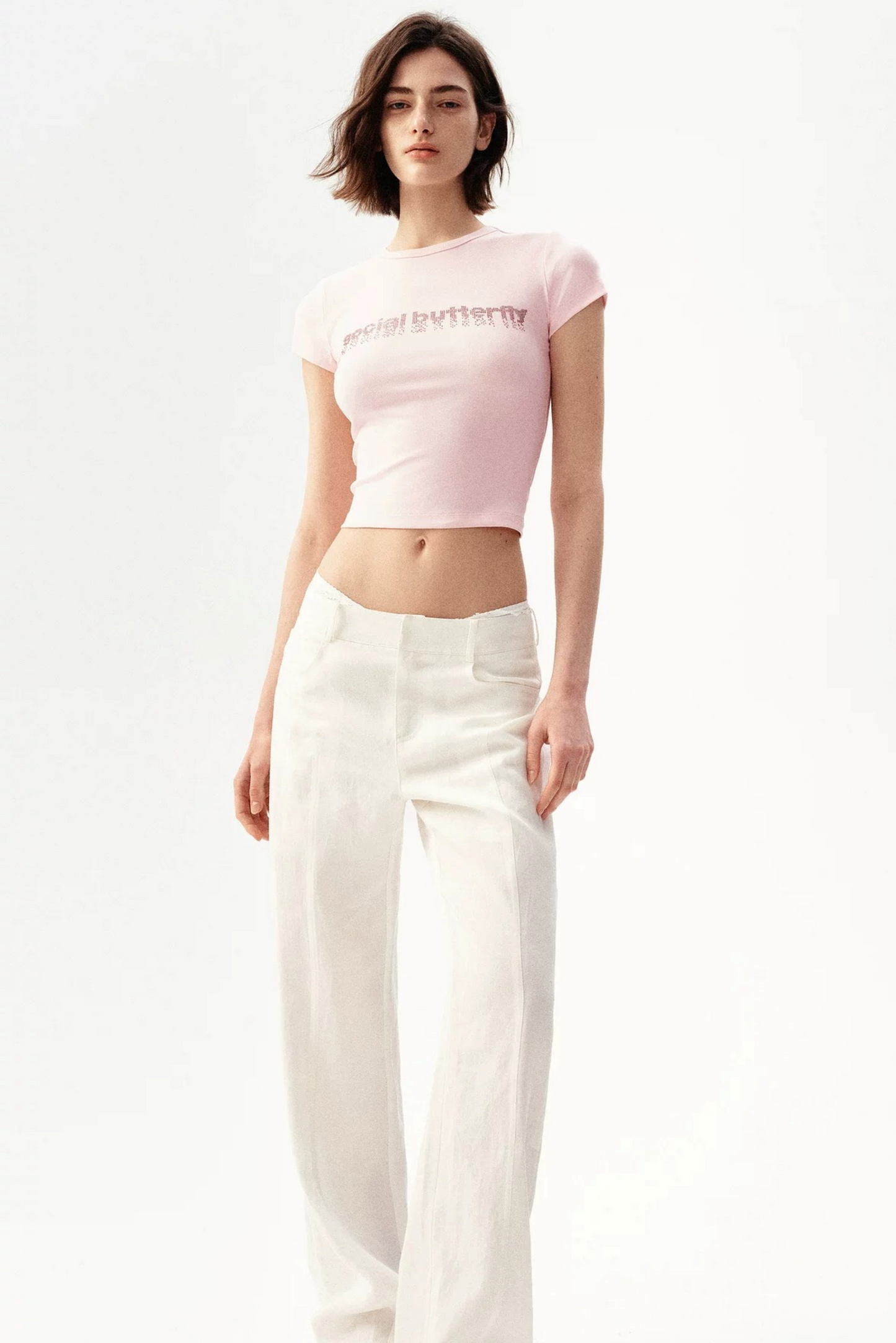 Maglia narrativa rosa con strass