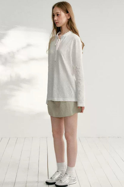 Hollow Floral Tie-Up Blouse