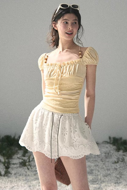 Haut dos nu en dentelle de rêve