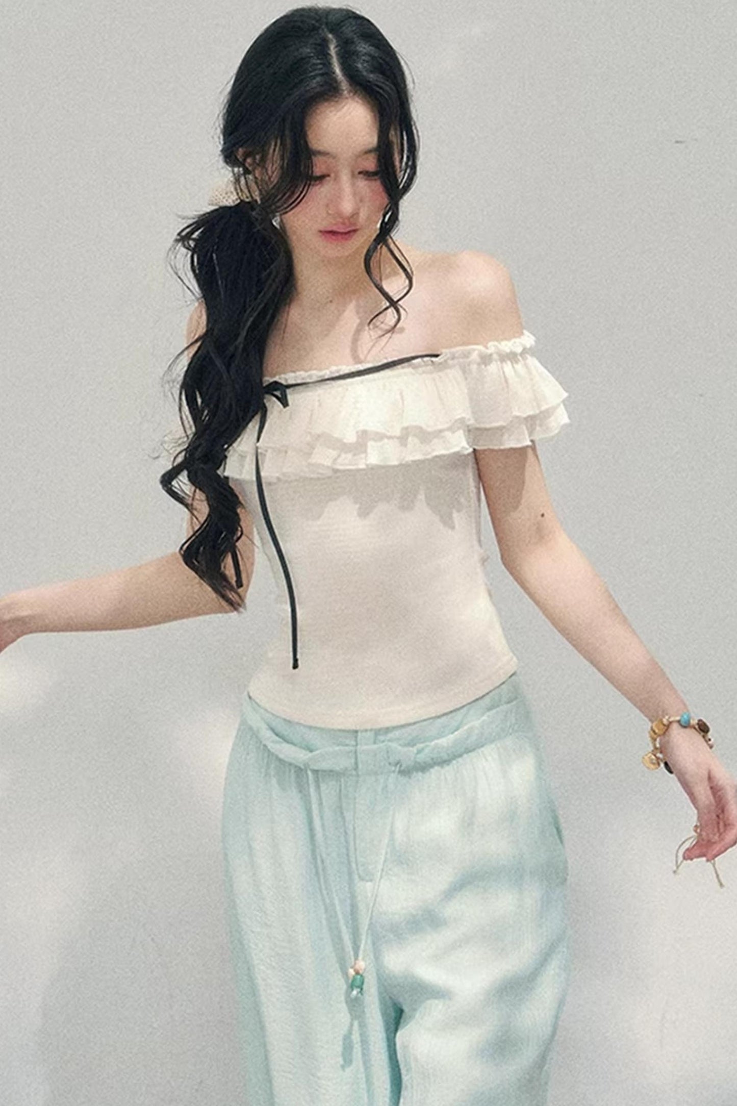 Schulterfreie Rüschenbluse