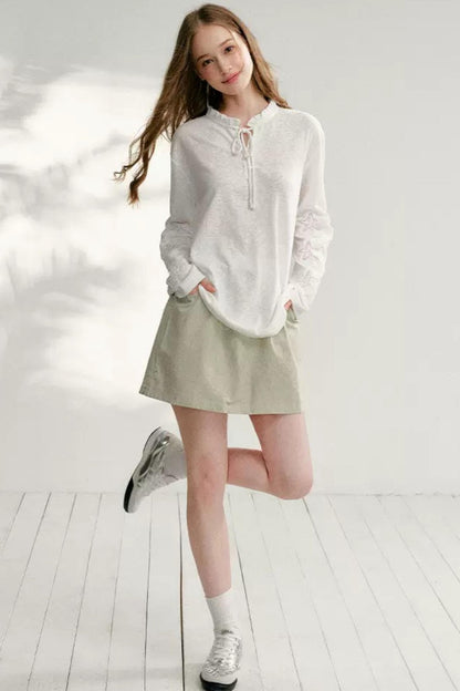 Hollow Floral Tie-Up Blouse