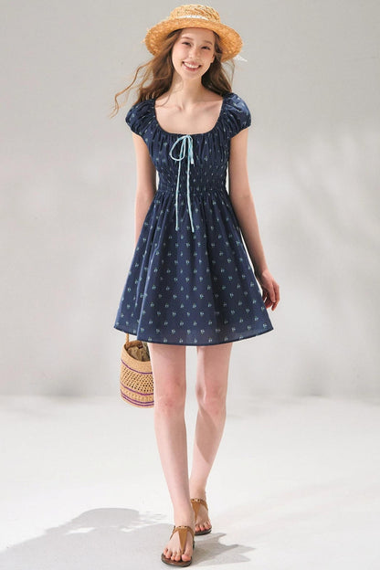 Abito floreale blu navy con lacci