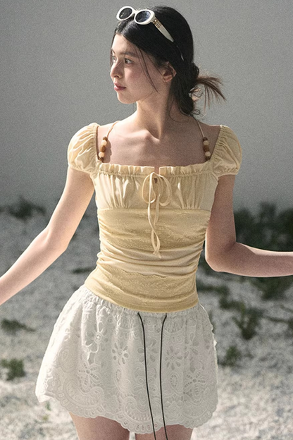 Haut dos nu en dentelle de rêve