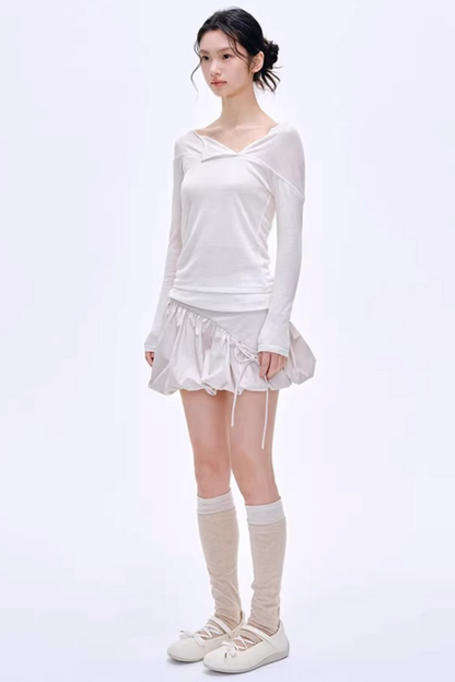 Blusa asimmetrica in misto lana