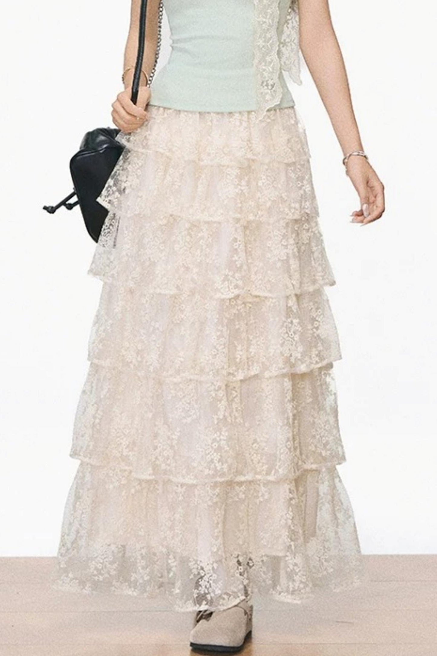 Conjunto coordinado de top y falda de encaje de punto