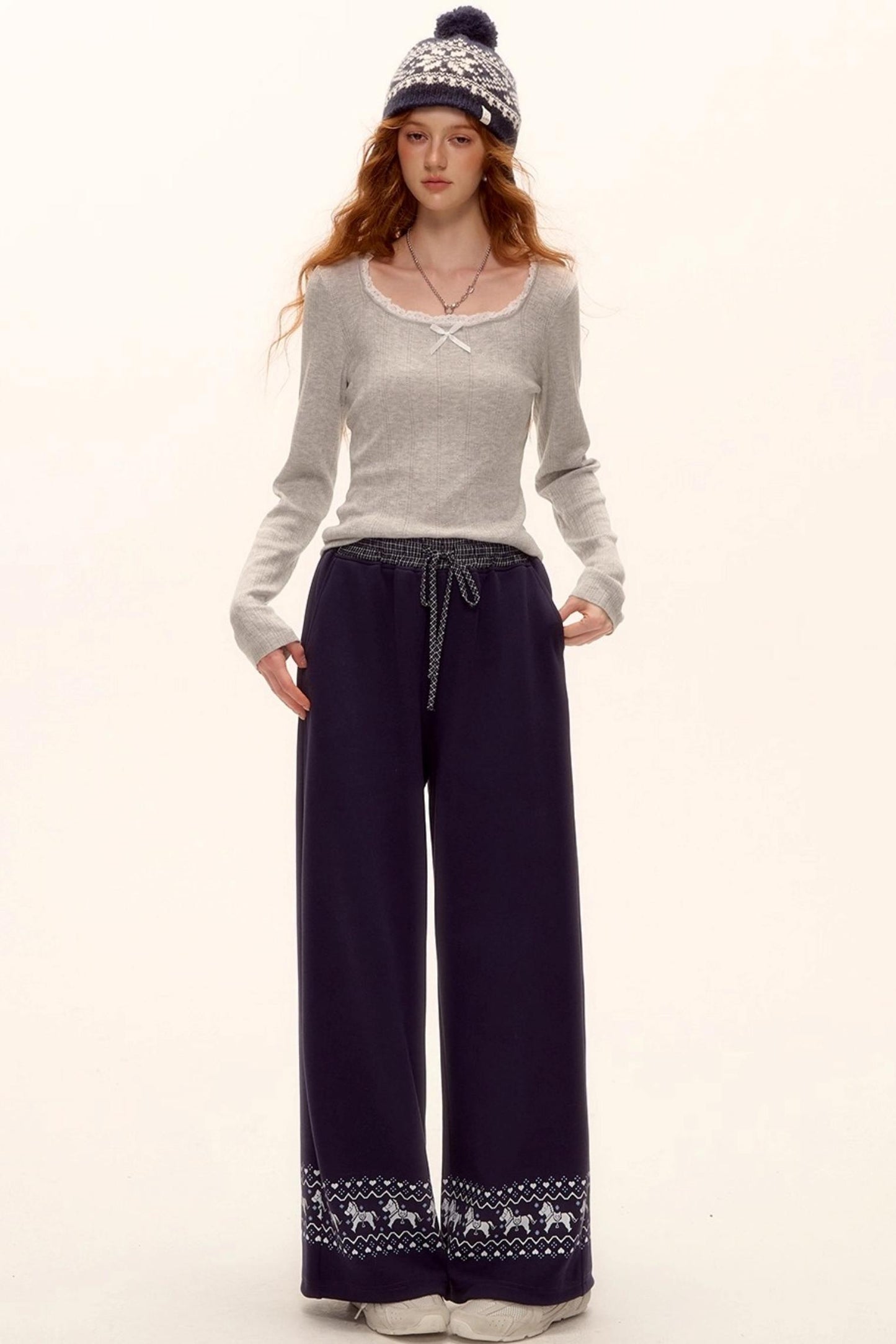 Lace-Trimmed Bow Hollow Knit Top