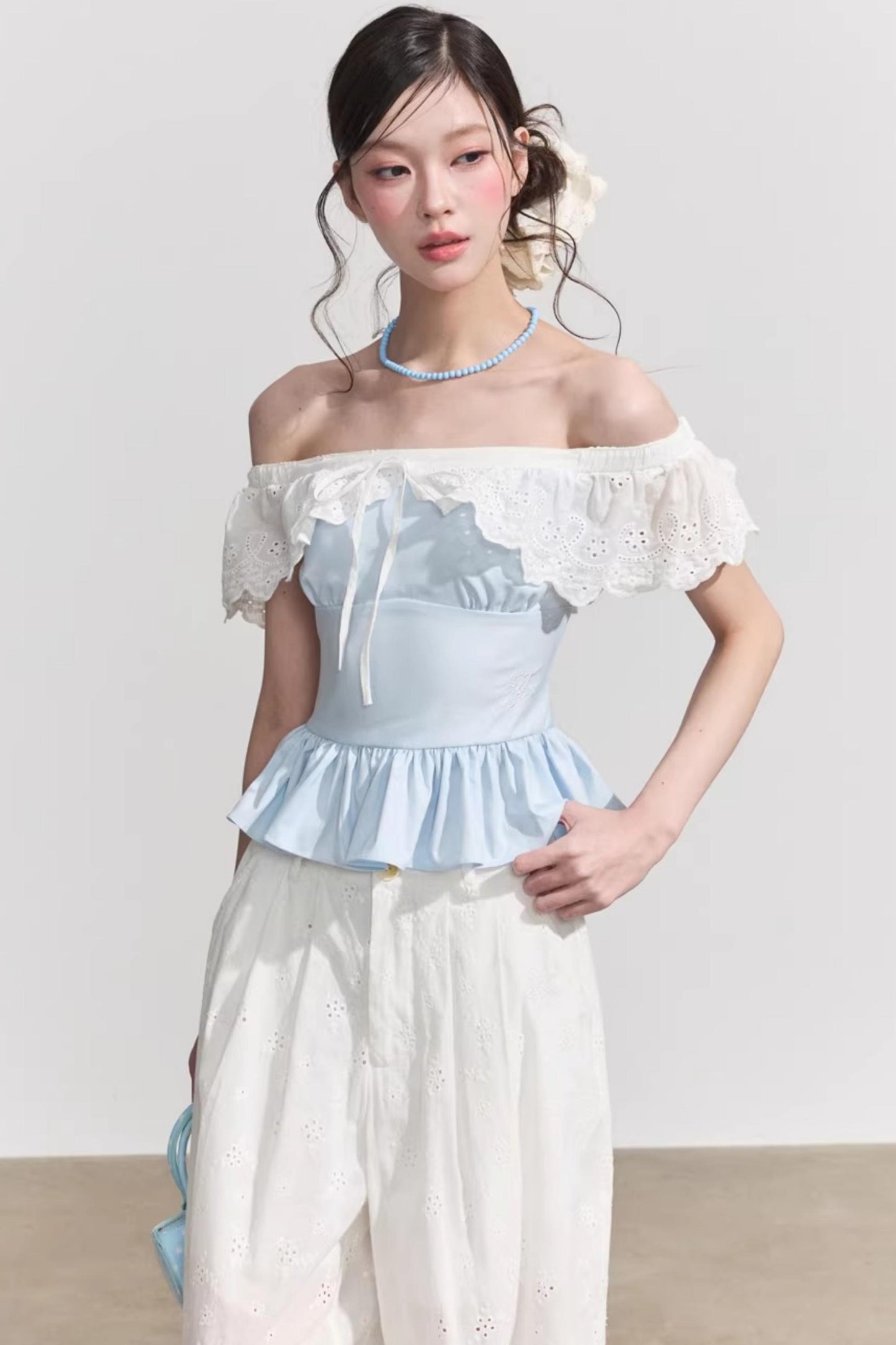 Blusa francese a fiori con volant