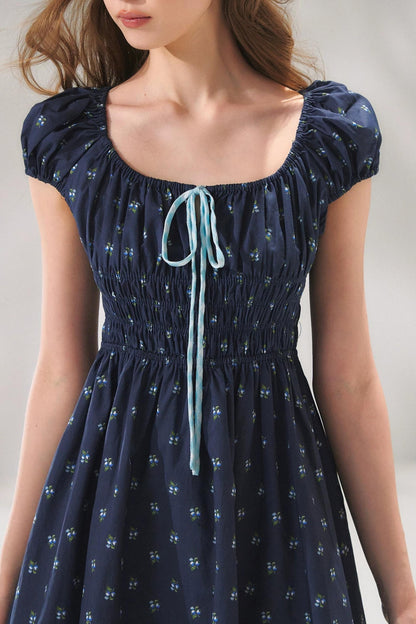 Abito floreale blu navy con lacci