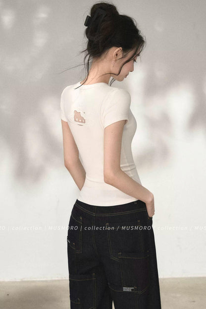 Top in maglia traforata ricamata