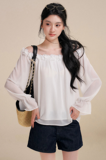 Blusa de gasa con flores tridimensionales