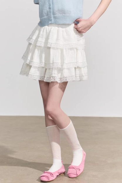 Chic white floral lace high-waisted mini skirt with an elegant A-line silhouette and delicate embroidery