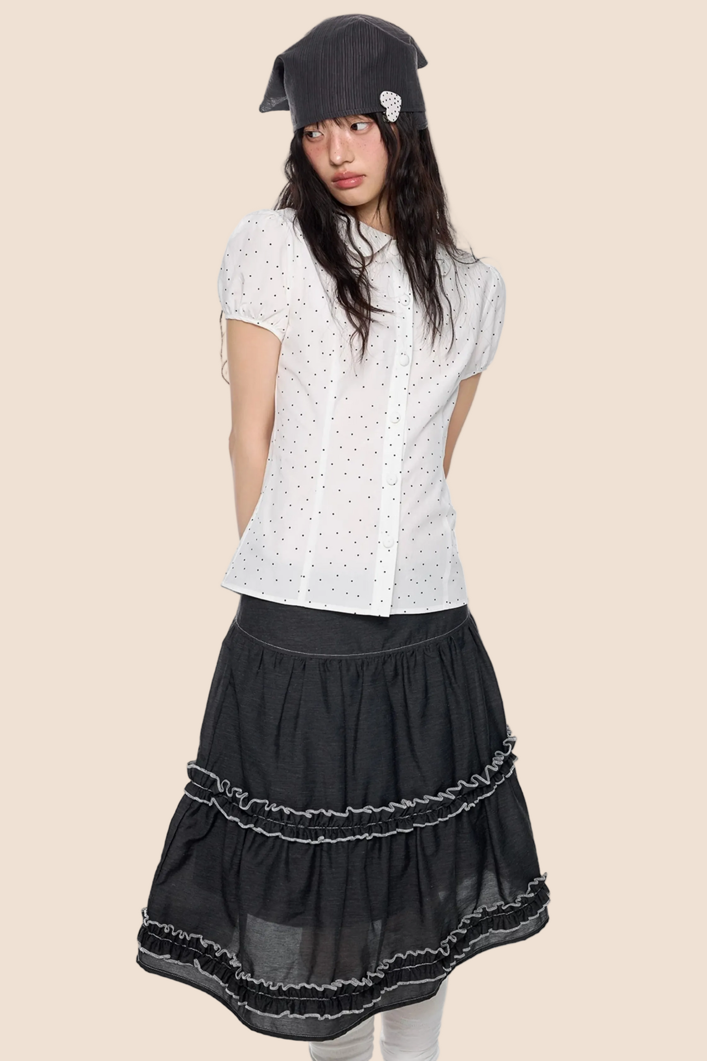 Blusa a pois con maniche a sbuffo
