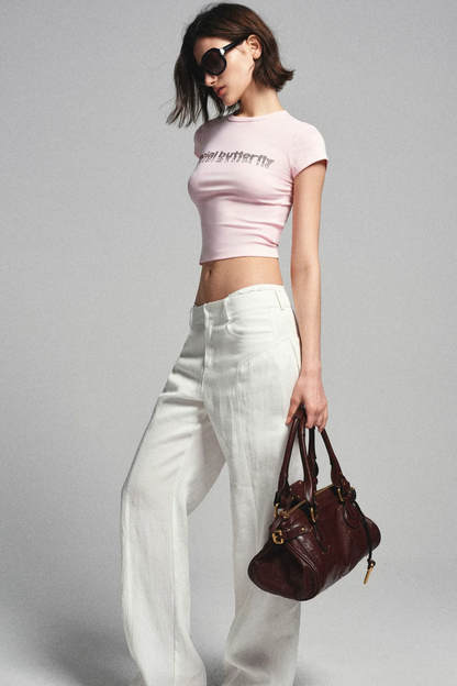 Maglia narrativa rosa con strass