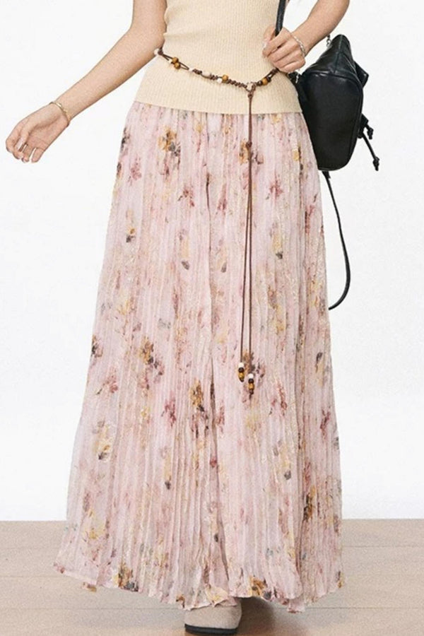 Conjunto de top de punto con mangas onduladas y falda plisada