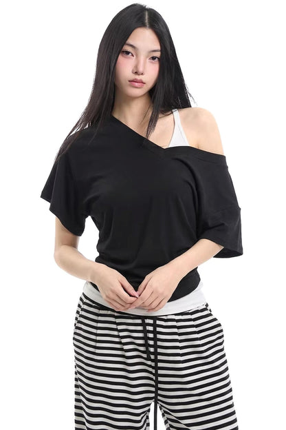 Set top a strati nero con spalle scoperte