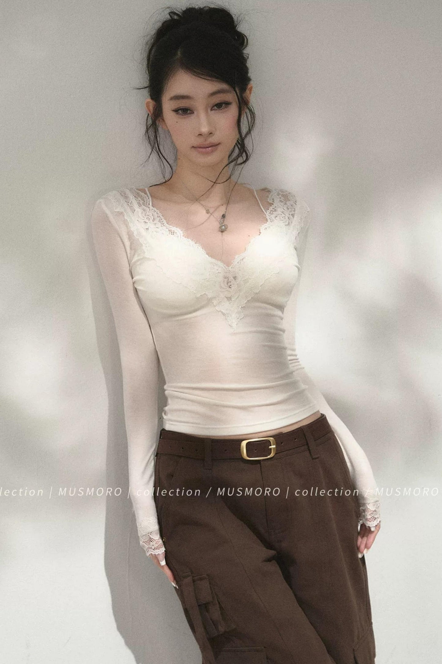 Top in maglia di pizzo a toppe